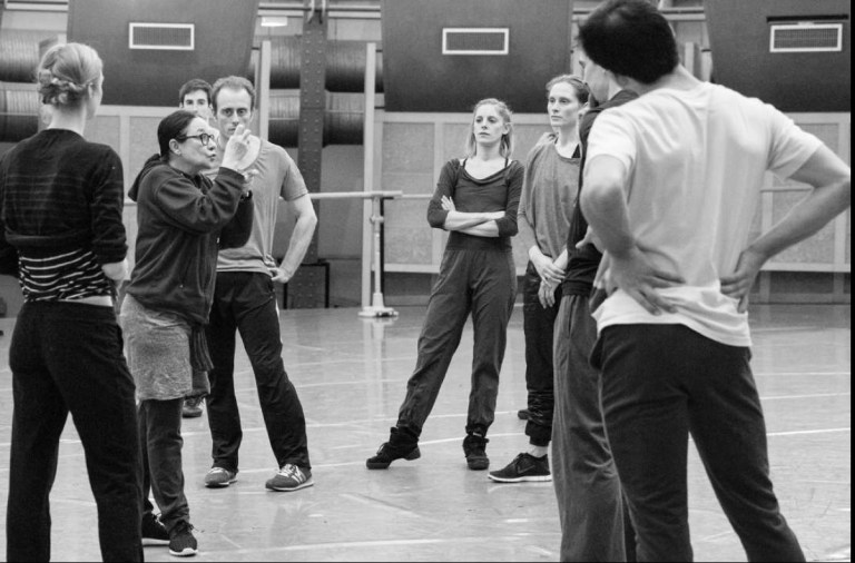 Marin instructs dancers copy